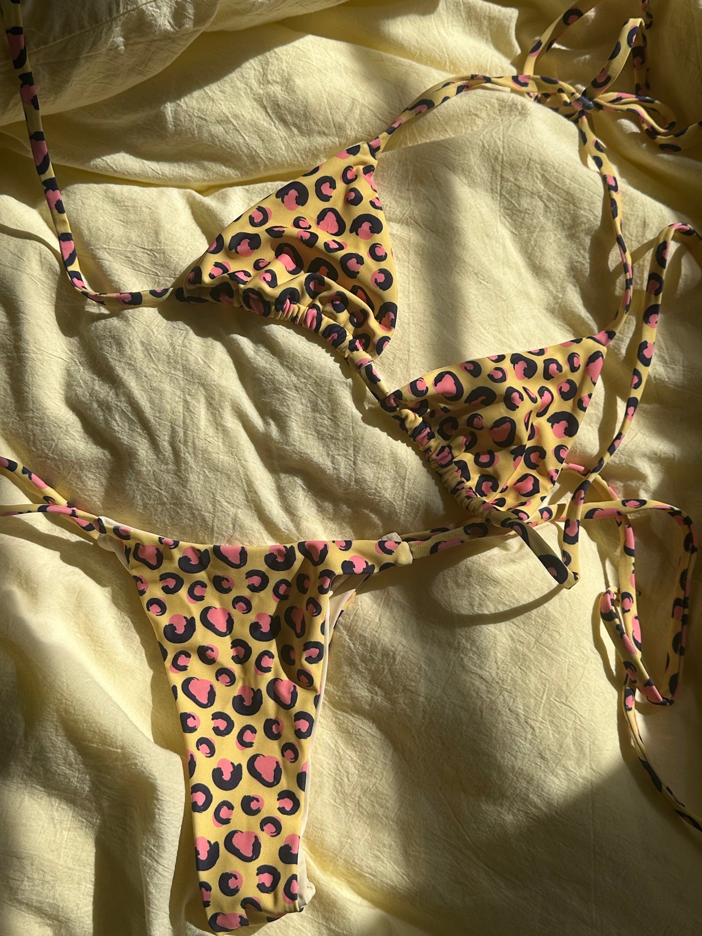 Pink cheetah triangle top