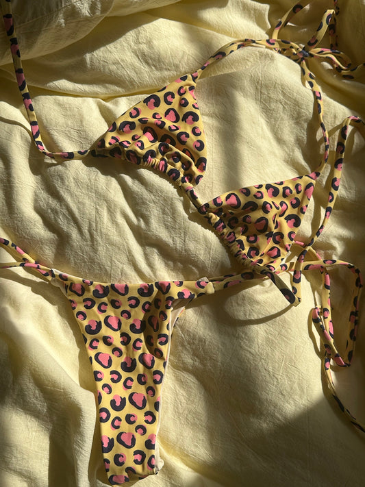 Pink cheetah triangle top