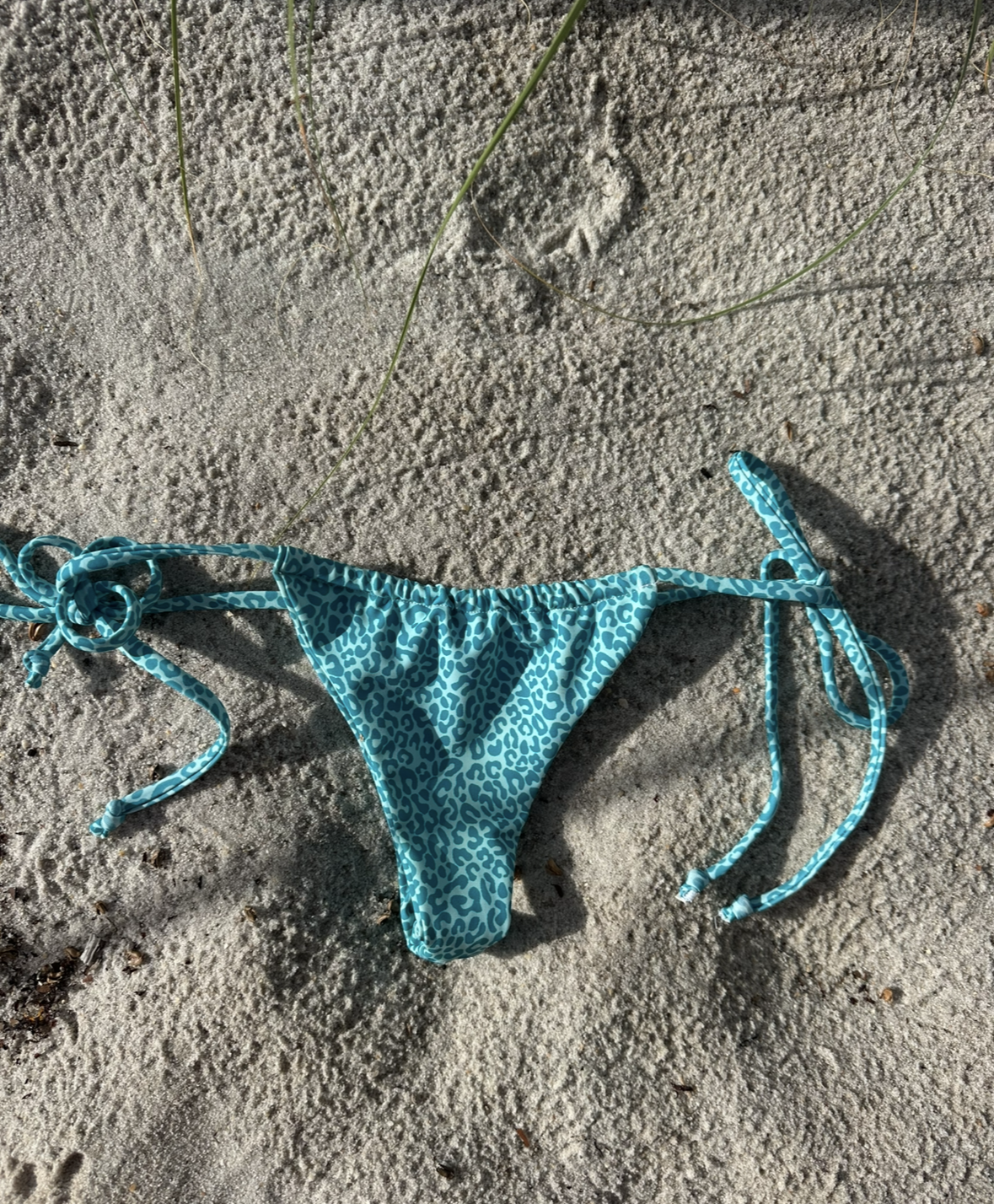 Blue cheetah slide bottoms